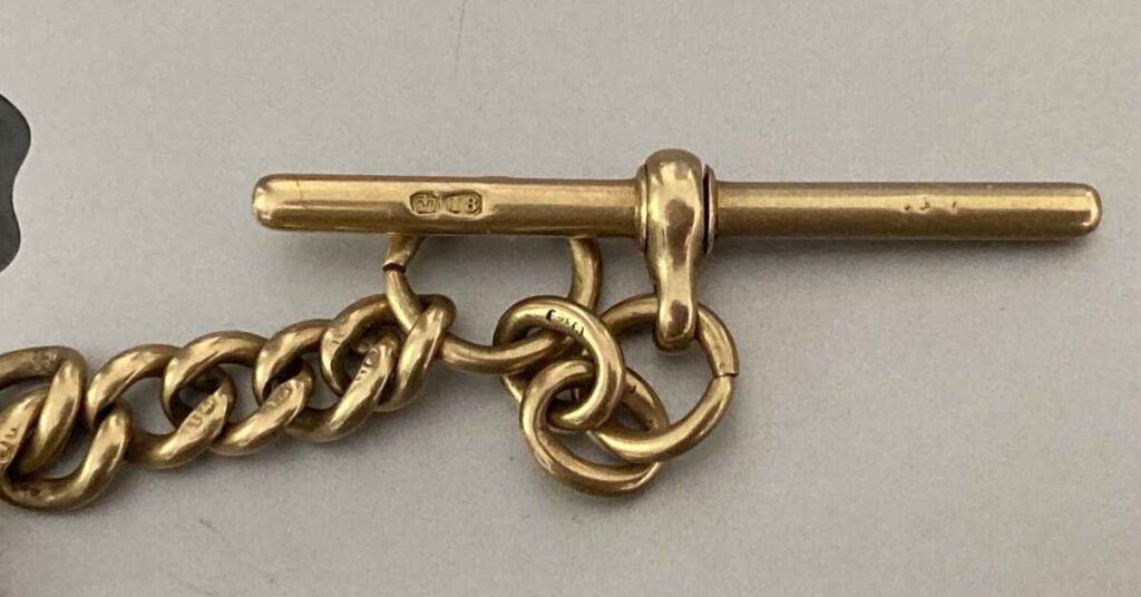 Piece of jewellery showing hallmarks